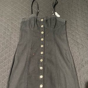 Black denim button dress.
